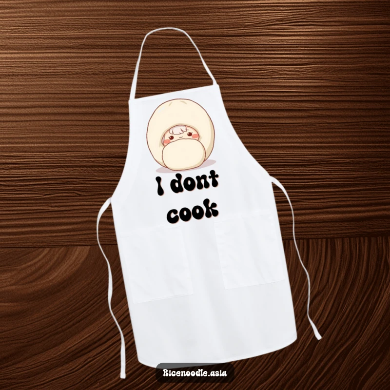 Funny kitchen apron with a shy rice noodle peeking behind a happy dumpling.