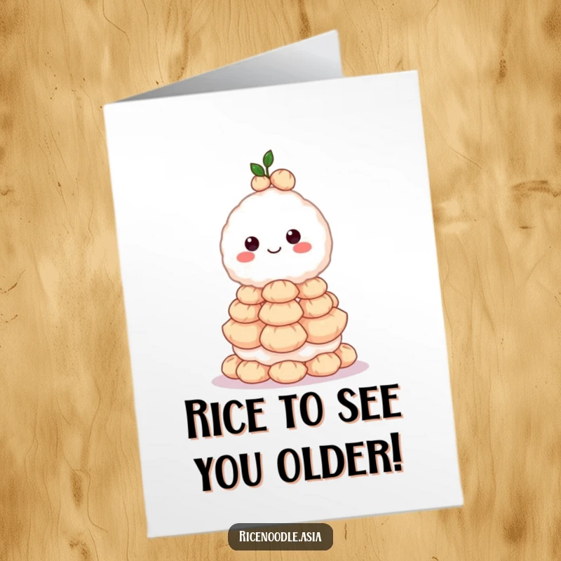 Funny Free Printable Birthday Card: A grinning rice ball character precariously balances a huge stack of tiny dumplings, looking thrilled.