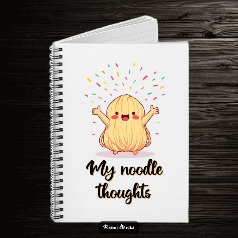 Funny notebook with a whimsical noodle bundle reaching enthusiastically towards a festive confetti shower on the cover, ready for your notes.